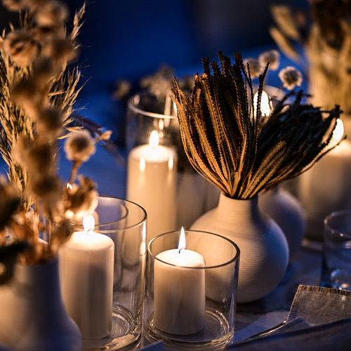 Candlelit table setting at BMW Skytop gala
